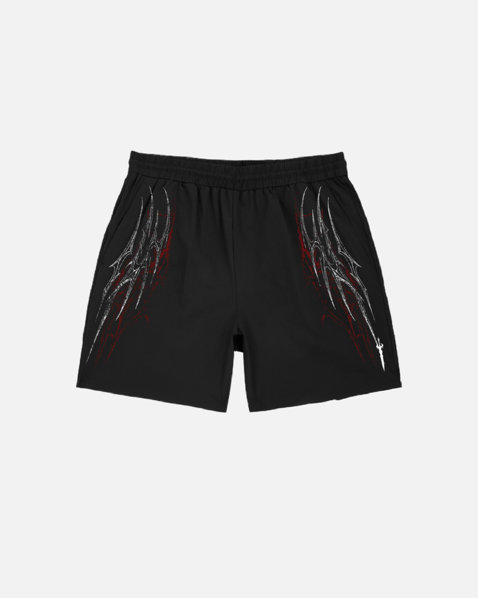 Black shorts with red and white designs on a light gray background