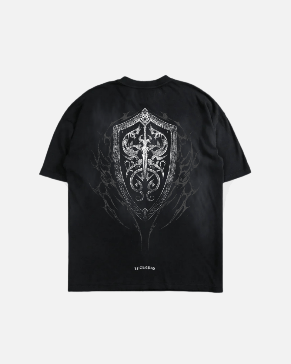 Black crew neck t-shirt with a vintage shield design that is white and occupies the central portion of the shirt.