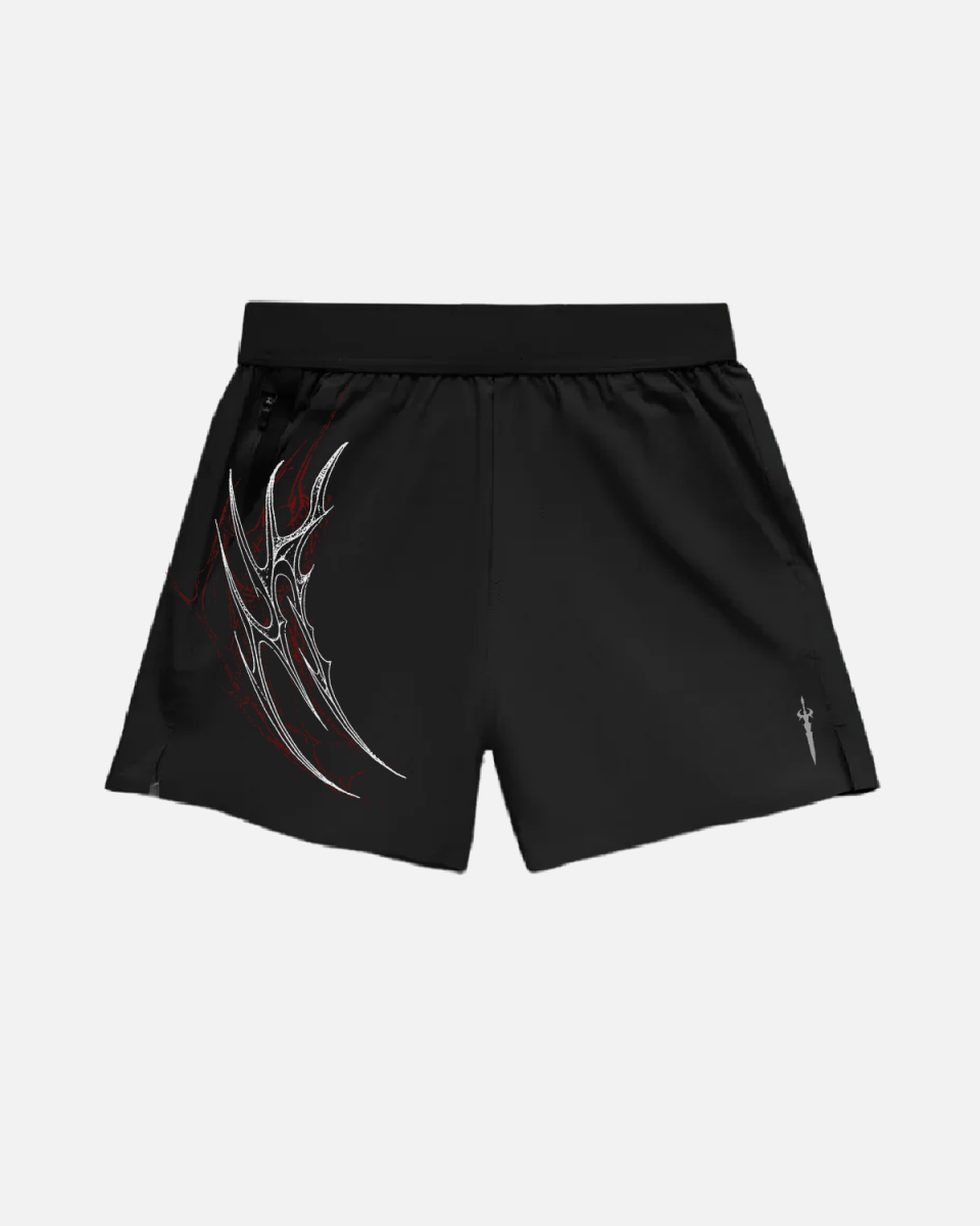 Black shorts with a design on a light gray background