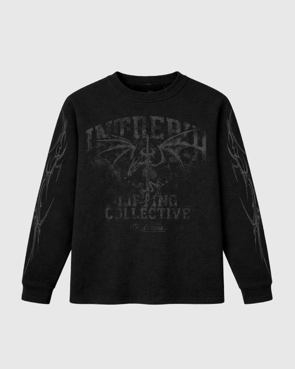 Black sweatshirt with graphic design on a light gray background