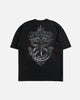 Black t-shirt with a white graphic design on a light gray background