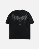 Black T-shirt with a graphic design in the center that includes text and an abstract image, likely a band or music-related merchandise.
